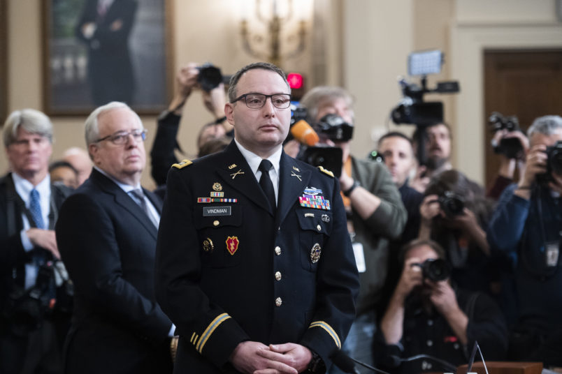 UNITED STATES - NOVEMBER 19: Lt. Col. Alexander Vindman, director of European affairs at the National Security Council, waits for the arrival of Jennifer Williams, an aide to Vice President Mike Pence, before testifying during the House Intelligence Committee hearing on the impeachment inquiry of President Trump in Longworth Building on Tuesday, November 19, 2019. (Photo By Tom Williams/CQ Roll Call)