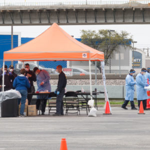 DALLAS, March 22, 2020 . Medical workers work at a drive-through COVID-19 testing site in Dallas, Texas, the United States, March 21, 2020. The number of COVID-19 cases in the United States topped 20,000 as of 1:30 p.m. Eastern Standard Time on Saturday ,1730 GMT, according to the Center for Systems Science and Engineering ,CSSE, at Johns Hopkins University. (Photo by Dan Tian/Xinhua via Getty)