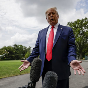 WASHINGTON, DC - AUGUST 06: President Donald Trump stops to talk to reporters as he departs the White House for a trip to Ohio where he will visit a Whirlpool factory on August 6, 2020 in Washington, DC. After the visit to the factory he will attend a fundraising reception and then head to his properties in New Jersey for the weekend. (Photo by Samuel Corum/Getty Images) *** Local Caption *** Donald Trump