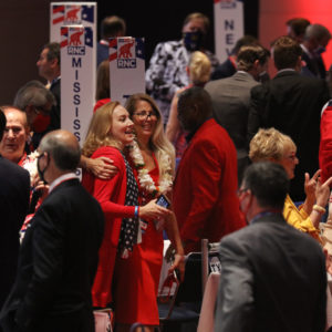 NYTRNC20A crowd mingles at the conclusion of President Trump’s speech to delegates in the Charlotte Convention Center’s Richardson Ballroom in Charlotte, NC on Monday, August 24. The delegates have gathered for the roll call vote to renominate Donald J. Trump to be President of the United States and Mike Pence to be Vice President.(Travis Dove for The New York Times)