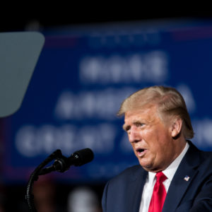 WINSTON SALEM, NC - SEPTEMBER 08: President Donald Trump addresses a crowd during a campaign rally at Smith Reynolds Airport on September 8, 2020 in Winston Salem, North Carolina. The president also made a campaign stop in South Florida on Tuesday. (Photo by Sean Rayford/Getty Images)