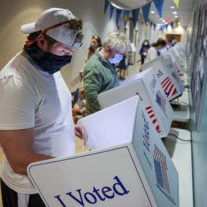CHARLESTON, SC - OCTOBER 30: Jake Hannay casts his in-person absentee ballot at Seacoast Church West Ashley on October 30, 2020 in Charleston, South Carolina. (Photo by Michael Ciaglo/Getty Images)