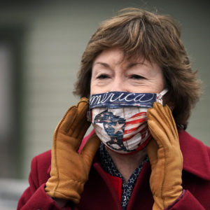 Republican Sen. Susan Collins speaks to workers at Reed and Reed, a contracting company, while campaigning Friday, Oct. 30, 2020, in Woolwich, Maine. Collins is seeking re-election against Democratic challenger Sara Gideon, the speaker of the Maine House. (AP Photo/Robert F. Bukaty)