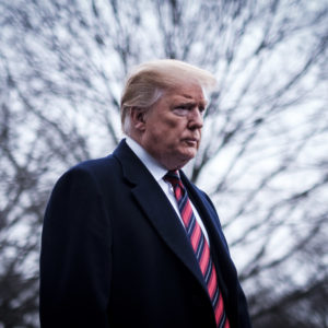 WASHINGTON, DC - JANUARY 19: President Trump stops to speak to reporters as he prepared to board Marine One on the South Lawn of the White House on January 19, 2019 in Washington, DC. Trump is traveling to Dover Air Force Base in Delaware to visit with families four Americans who were killed in an explosion Wednesday in Syria. (Photo by Pete Marovich/Getty Images)