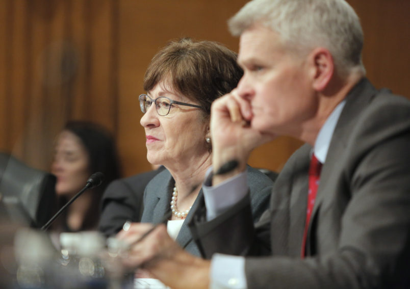 WASHINGTON, D.C. - DECEMBER 12: Sen. Susan Collins listens to testimony during a hearing about the cost of prescription drugs to the Health, Education, Labor and Pensions committee on Capitol Hill in Washington, D.C. on Tuesday, December 12, 2017. In the foreground is Sen. Bill Cassidy (R-LA). (Staff Photo by Gregory Rec/Staff Photographer)