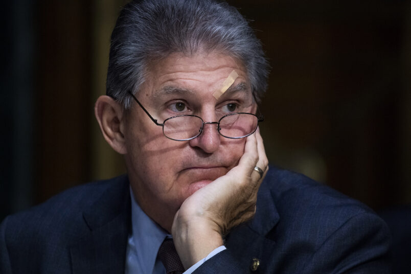 UNITED STATES - AUGUST 04: Sen. Joe Manchin, D-W.Va., is seen during the Senate Appropriations Committee markup of the “FY 22 Energy and Water, Agriculture, and MilCon VA Appropriations Bills,” in Dirksen Building on Wednesday, August 04, 2021. (Photo By Tom Williams/CQ Roll Call)