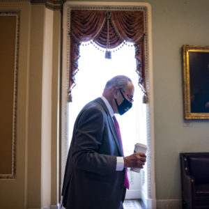 WASHINGTON, DC - AUGUST 10: U.S. Senate Majority Leader Chuck Schumer (D-NY) heads to his office in the U.S. Capitol Building on August 10, 2021 in Washington, DC. The Senate will vote today on the $1 trillion infrastructure bill ahead of August recess. (Photo by Samuel Corum/Getty Images) *** Local Caption *** Chuck Schumer