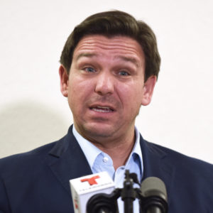 LAKELAND, FLORIDA, UNITED STATES - 2021/08/21: Florida Governor Ron DeSantis speaks at a press conference to announce the opening of a monoclonal antibody treatment site for COVID-19 patients at Lakes Church in Lakeland, Florida. DeSantis stated that the site will offer the Regeneron treatment, and will operate 7 days a week, treating 300 patients a day. (Photo by Paul Hennessy/SOPA Images/LightRocket via Getty Images)